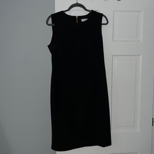Black Calvin Klein dress with gold zip